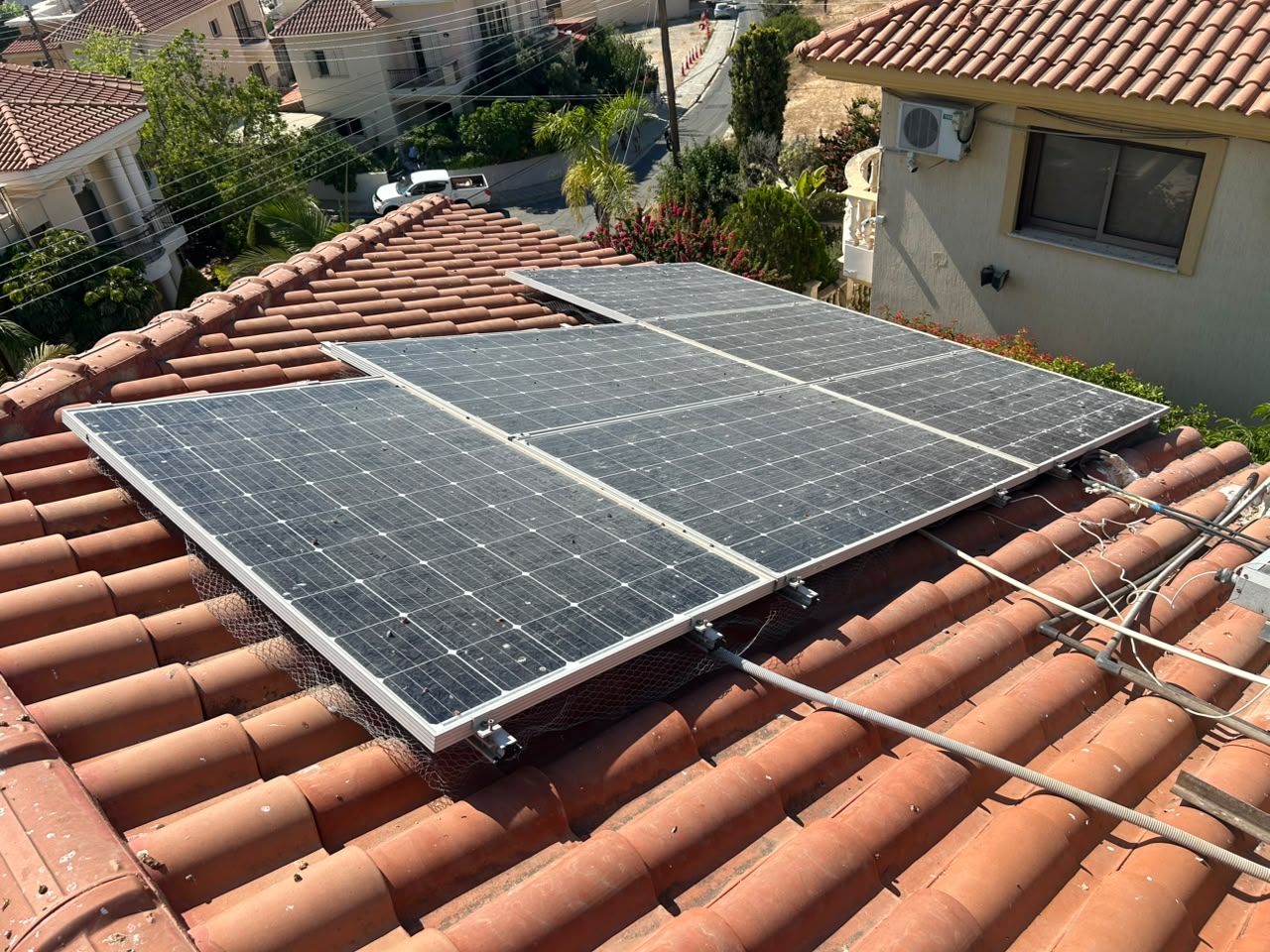 Solar panels before cleaning, covered in dust film